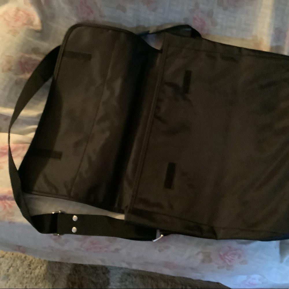 Nylon bag. Brand new. Perfect for small books and laptop